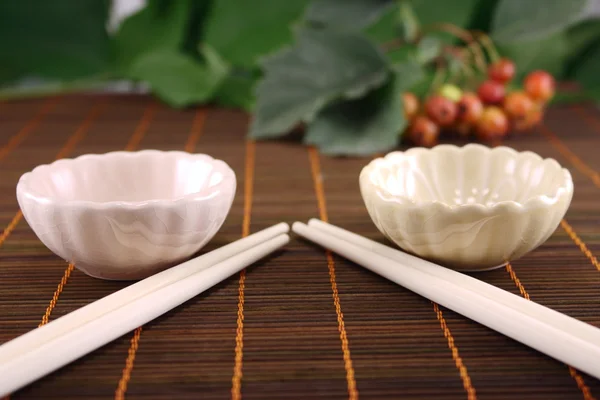 Stock image Two cup and china chopstick