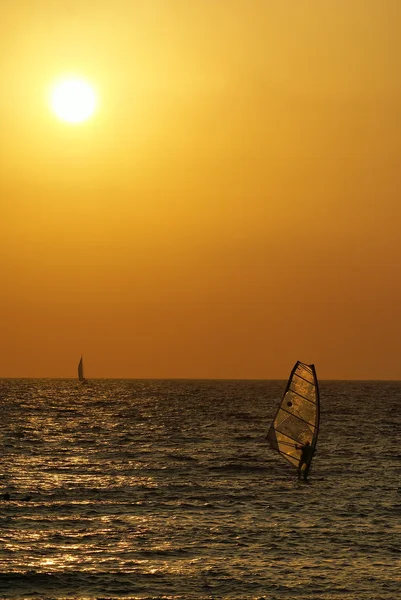 stock image Sea sunset with windsurfer