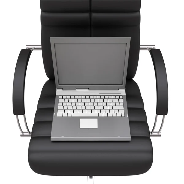 Ноутбук в офисном кресле — стоковое фото