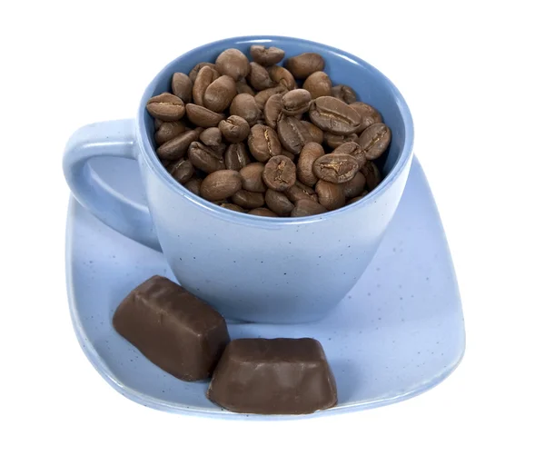 Cup with coffe beans and two chocolate c — Stock Photo, Image