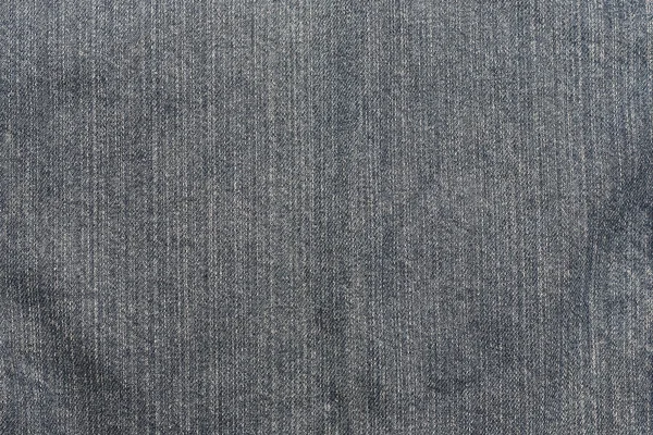 De kleur van de achtergrond van de textuur van de blue jeans — Stockfoto
