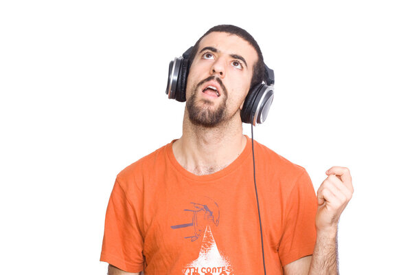Young man listening music with headphone