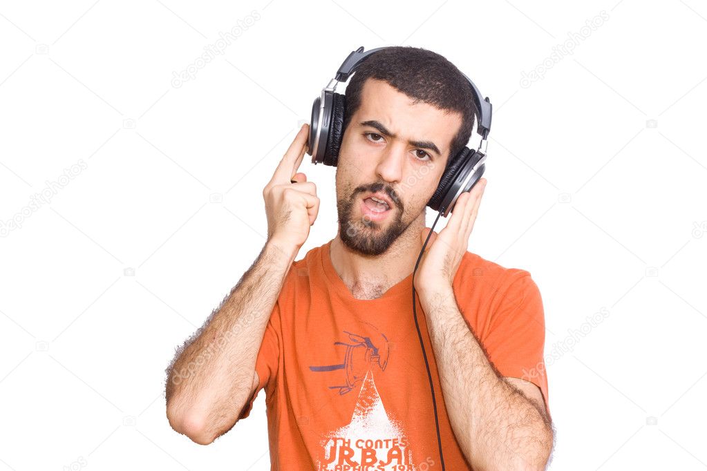 Young man listening music with headphones