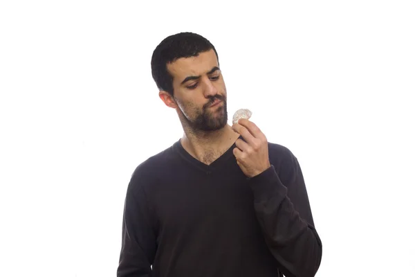 Man eating a sweet biscuit — Stock Photo, Image