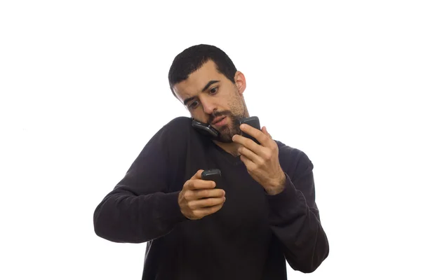 Homem enlouquecendo com muitos telefones — Fotografia de Stock