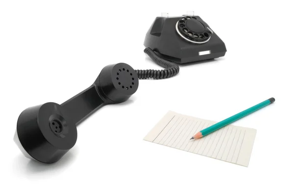 Teléfono negro y lápiz — Foto de Stock