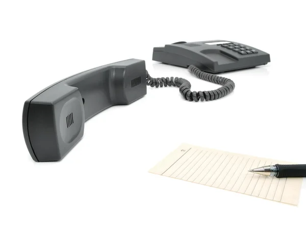 Grey telephone and pen — Stock Photo, Image