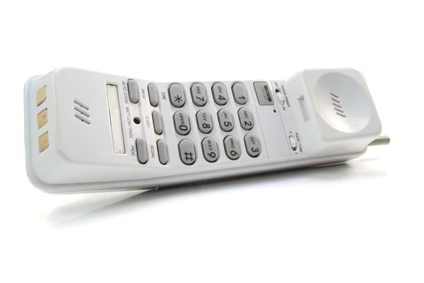 Телефон на белом — стоковое фото