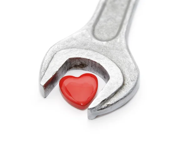 Spanner to heart — Stock Photo, Image