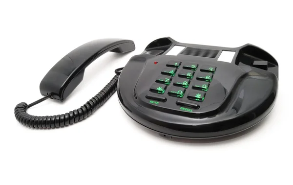 Schwarzes Telefon mit grünen Nummern — Stockfoto