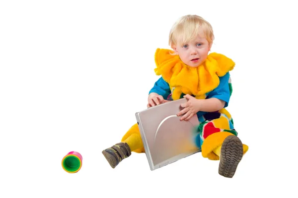 Niño sosteniendo portátil —  Fotos de Stock
