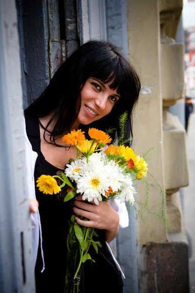 Girl with bouquet — Stock Photo, Image
