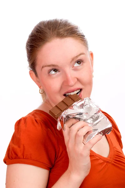 महिला चॉकलेट खाने — स्टॉक फ़ोटो, इमेज