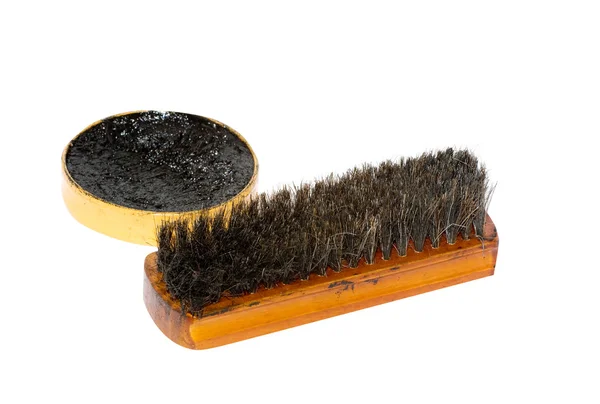 Shoe wax and a brush Stock Picture
