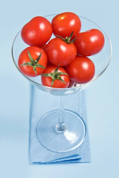 Cherry tomatoes in glass — Stock Photo, Image