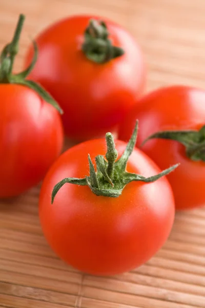 Чотири помідори — стокове фото