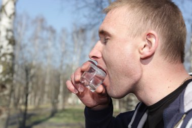 Man drinks vodka clipart