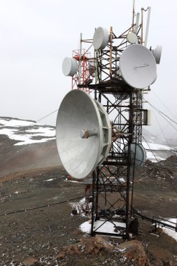 Telecom mast in mountains clipart