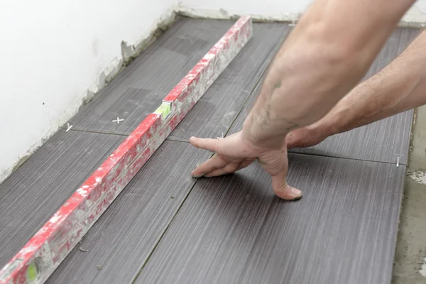 Installing Floor Tile — Stock Photo, Image