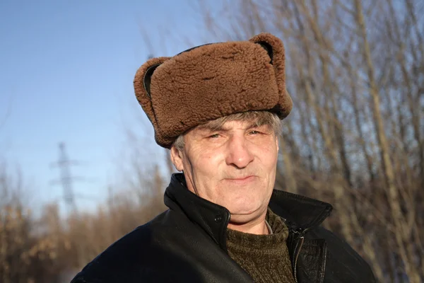 Man in fur-cap — Stock Photo, Image