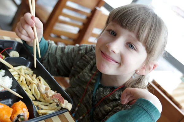 Little girl in restaurant — Stock Photo, Image