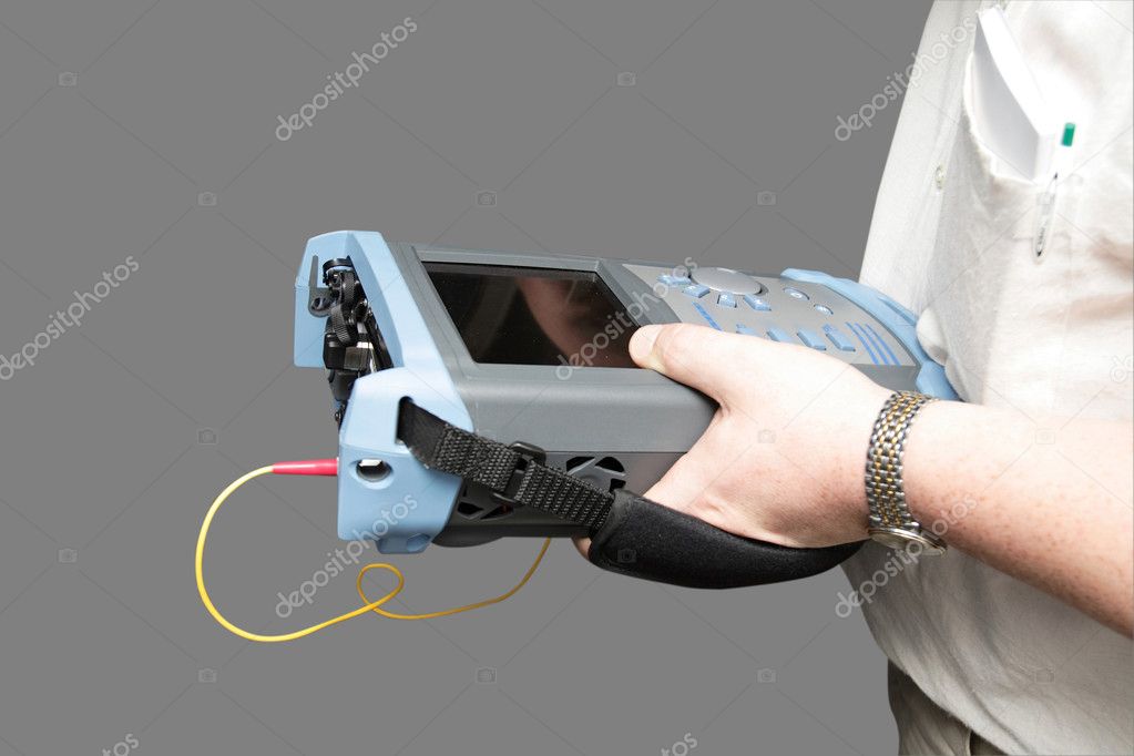 Engineer with reflectometer