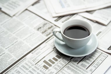 Coffee over newspaper clipart