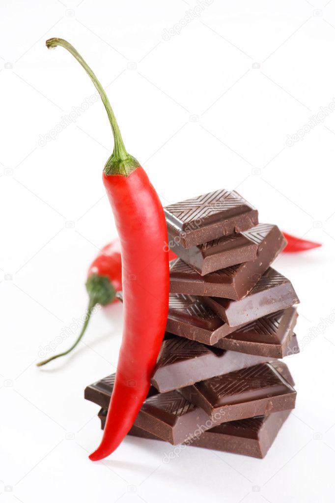 Dark chocolate and chili pepper — Stock Photo © Shebeko 1095969
