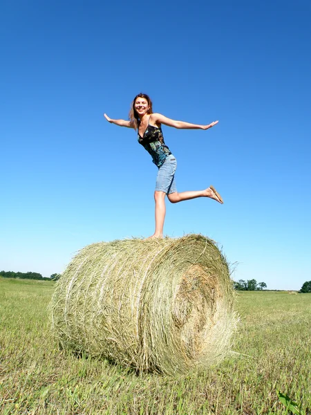 stock image Girl on a haystack