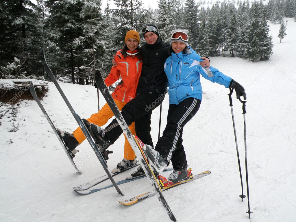 Happy friends on ski resort