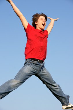 Happy boy jumping. clipart