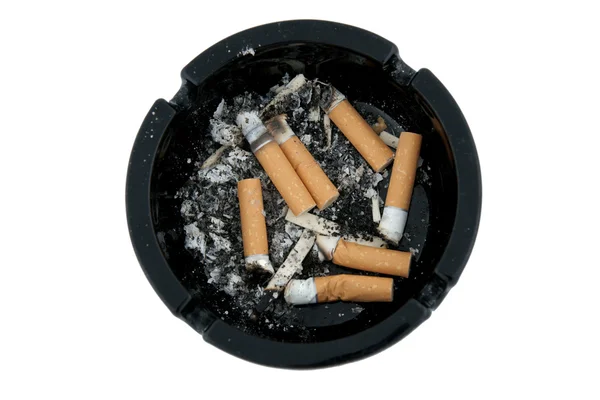 Cigarros no cinzeiro preto — Fotografia de Stock