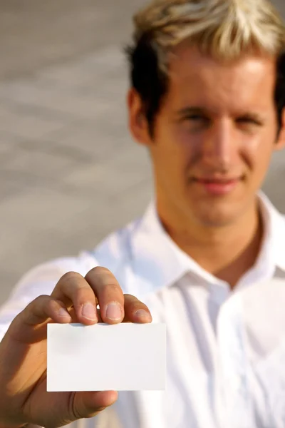 Blank business card in a hand — Stock Photo, Image