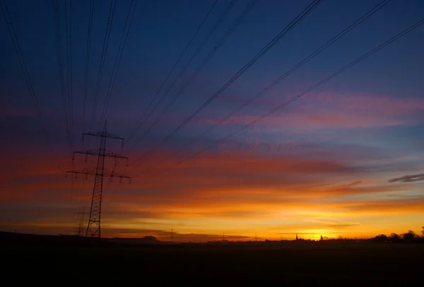 stock image Sunrise and power line