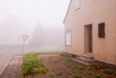 Fog in abandoned town Pier in Germany clipart