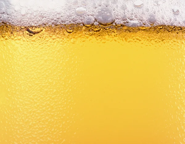 Cerveja e espuma de cerveja. Textura — Fotografia de Stock