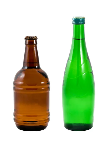 Различные бутылки на белом фоне — стоковое фото