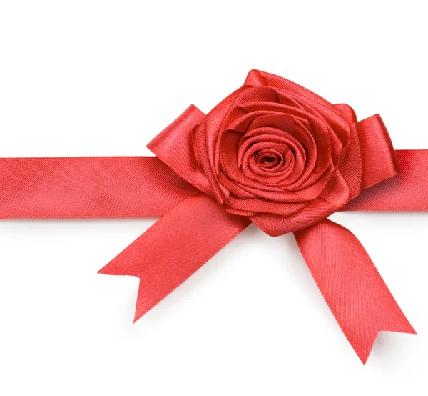 Beautiful red bow and rose on white back — Stock Photo, Image