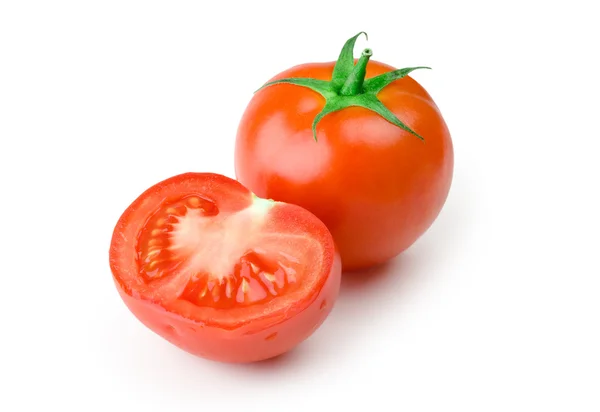 Two tomatoes on white background one of — Stock Photo, Image
