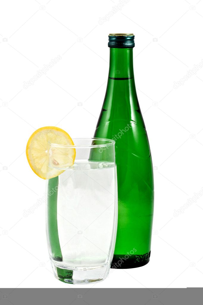 Green bottle and lemonade in glass — Stock Photo © Timmary 1191666