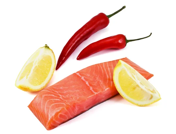 Fish, lemon, pepper on white backgroun — Stock Photo, Image