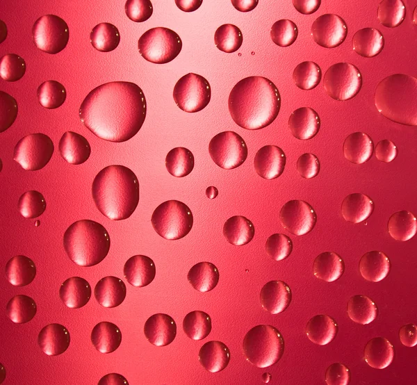 Rode water drop achtergrond — Stockfoto
