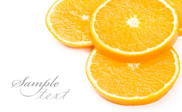 Naranja en rodajas sobre un fondo blanco — Foto de Stock