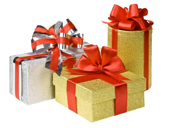 Золотые и серебряные коробки с подарками и луком — стоковое фото