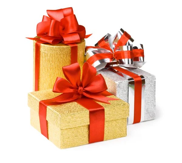 Gold and silver boxes with gifts and bow — Stock Photo, Image