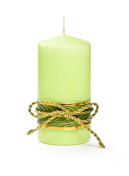 Candle with a gold ribbon — Stock Photo, Image