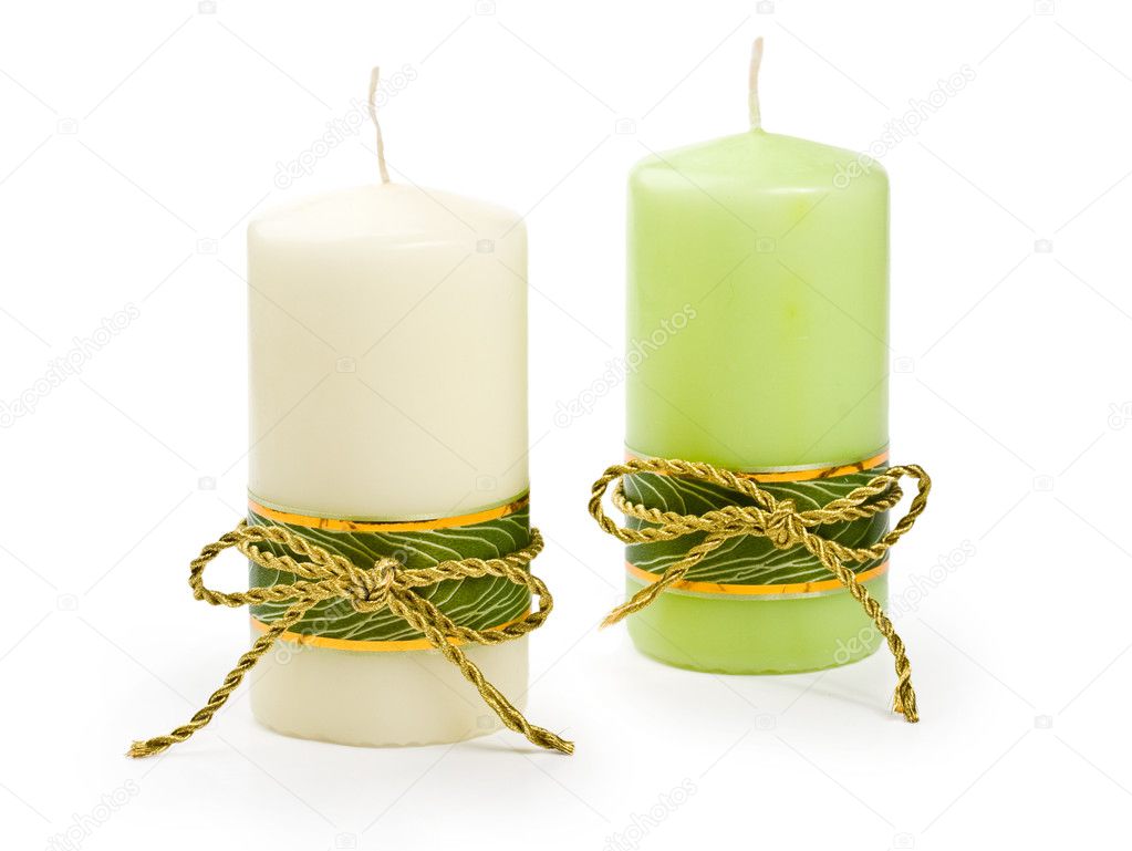 Candles with a golden ribbon