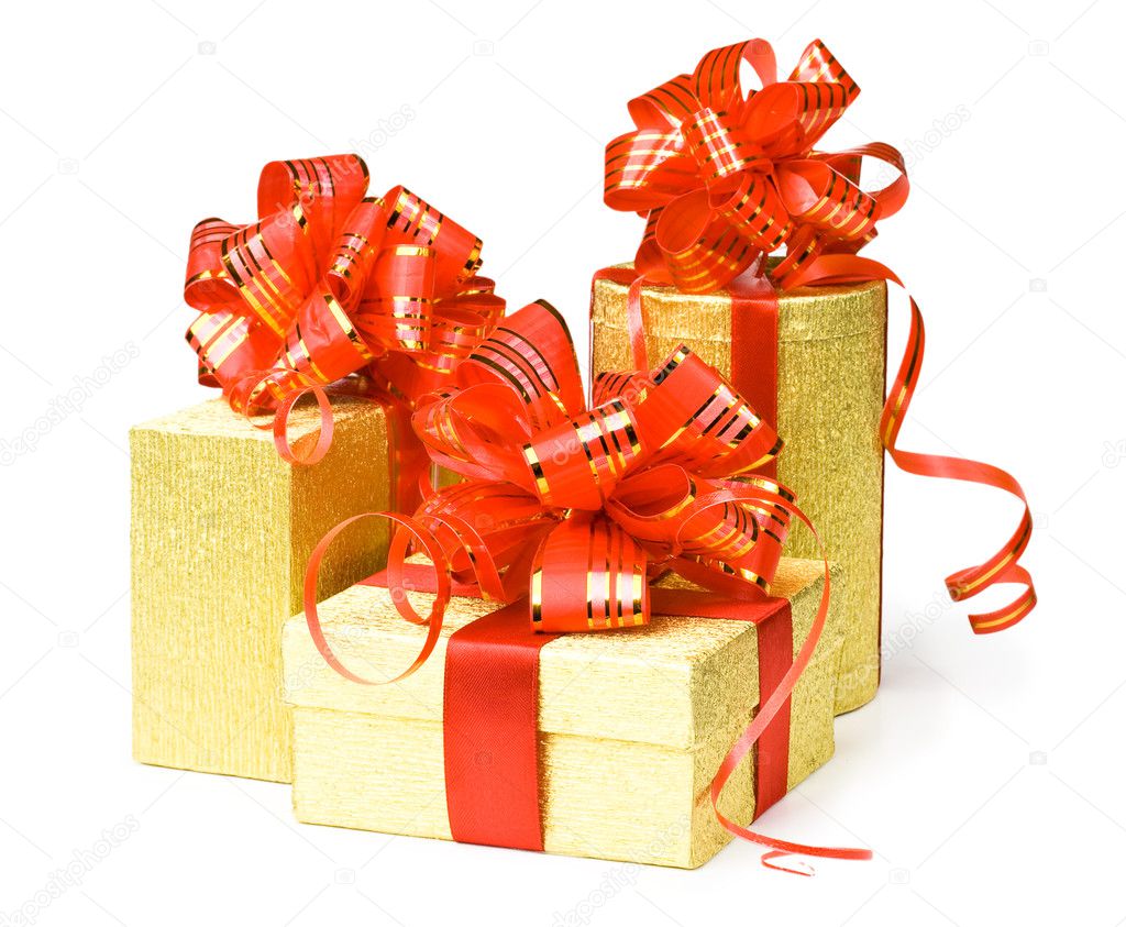 Gold gift boxes with red ribbons and bow