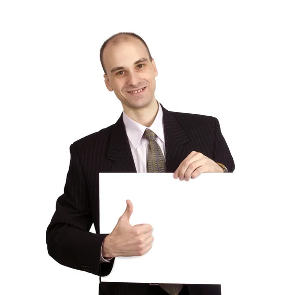 Hombre sosteniendo un signo en blanco — Foto de Stock