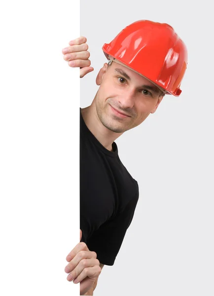 Travailleur de la construction avec un panneau vierge — Photo